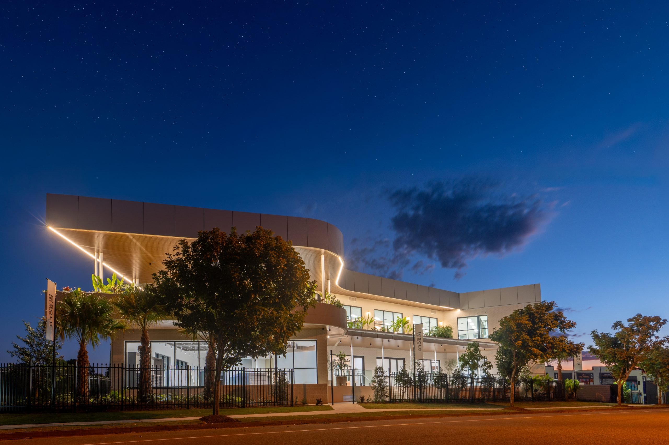 Headquarters building at dusk with lit soffits