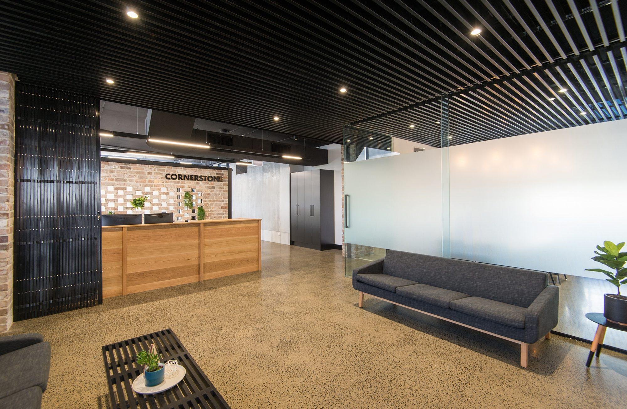 Lounge area with timber batten ceiling and feature lighting