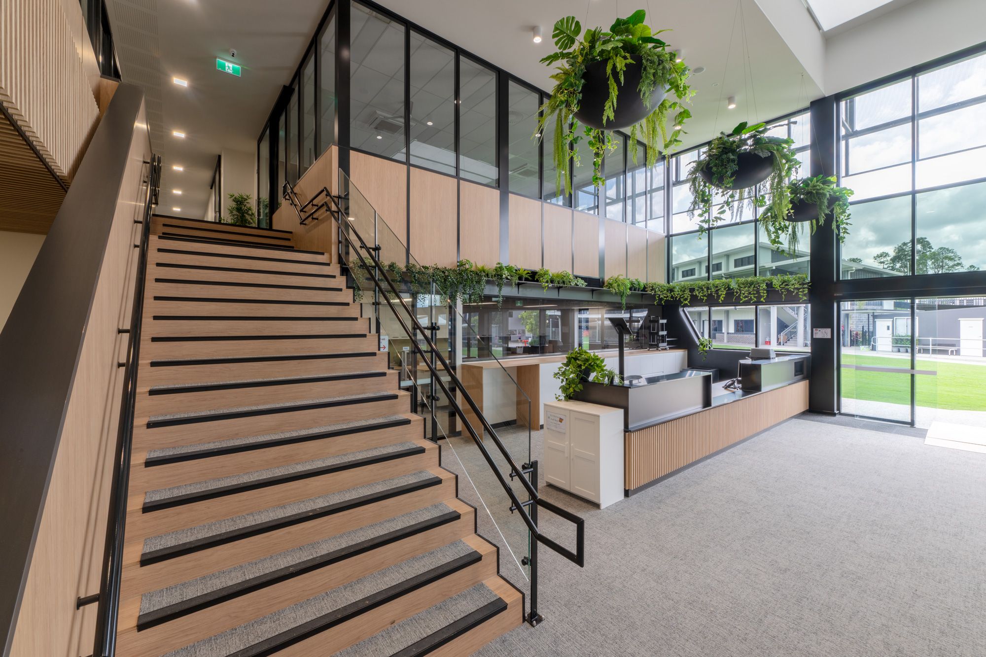 School library atrium with feature stair and planting