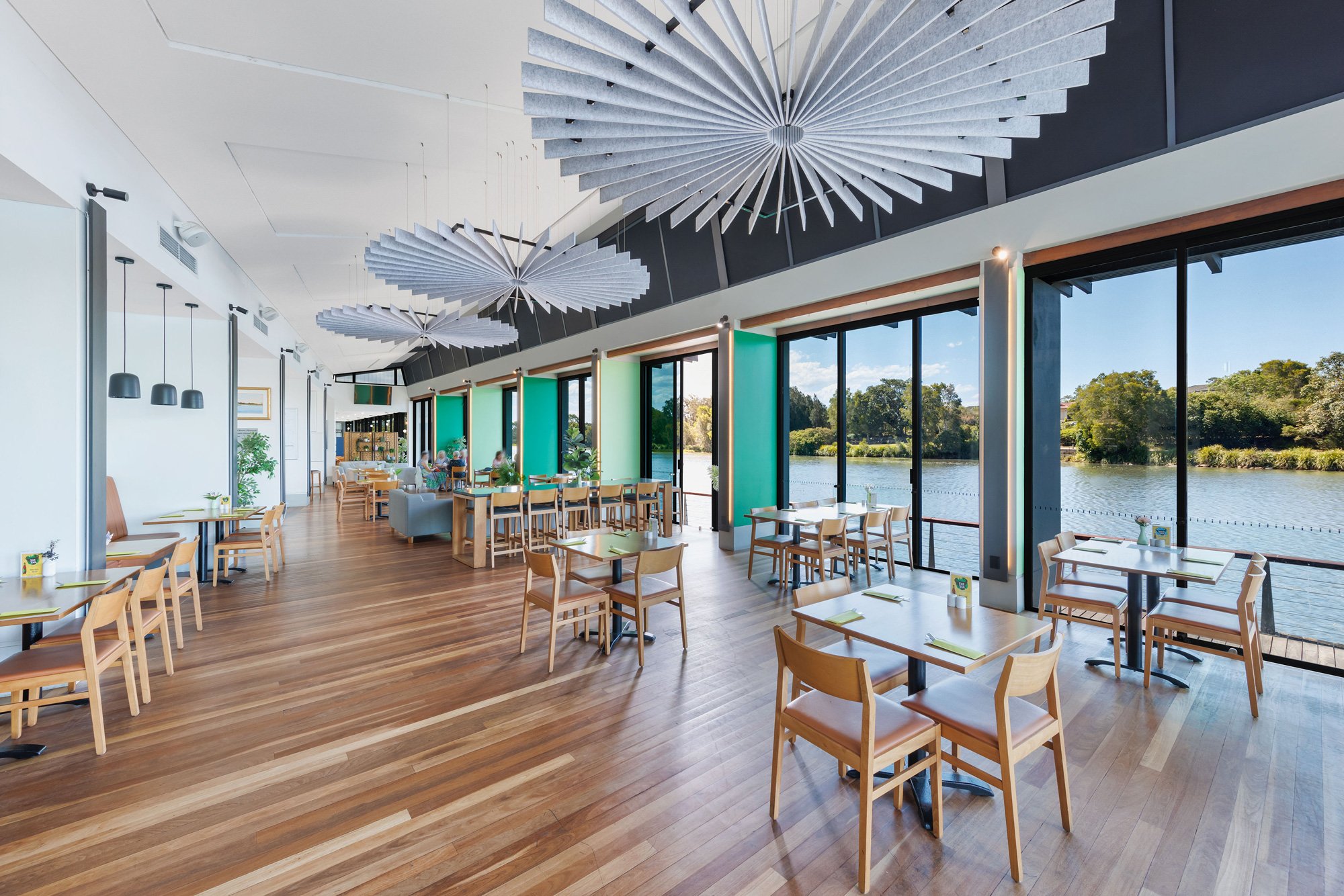 Covered deck seating beside the water