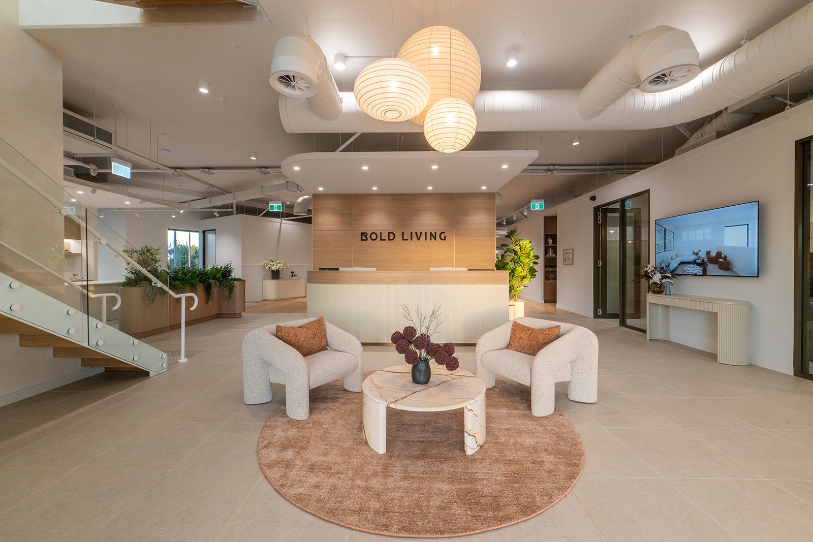 Corporate headquarters reception with feature pendant lighting