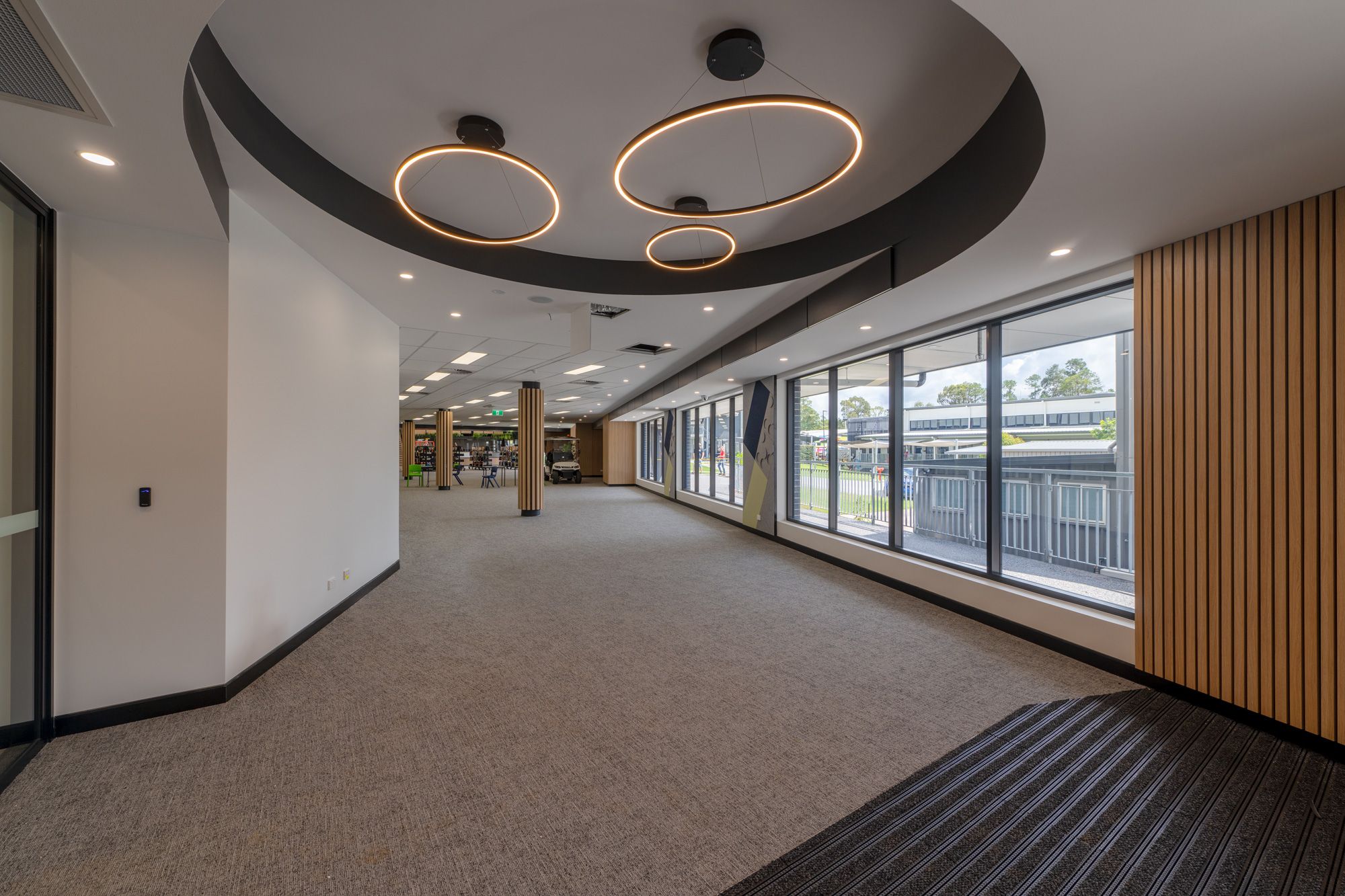 Foyer with circular ceiling detail and feature lighting